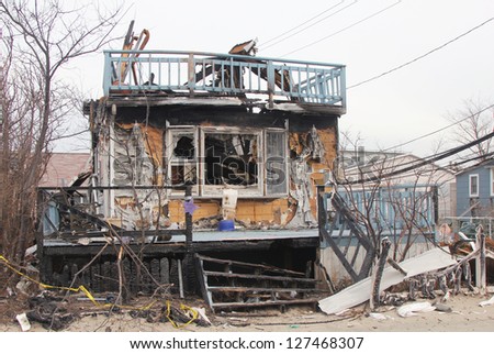 BREEZY POINT, NEW YORK- FEBRUARY 7: Devastated area in Breezy Point, NY three months after Hurricane Sandy on February 7, 2013. More than 80 houses were destroyed in out-of-control six-alarm blaze.