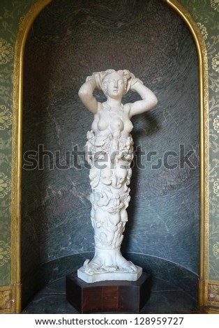 PARIS, FRANCE -AUGUST 19:Polymast statue of Nature by Tribolo at Palace of Fontainebleau near Paris on August 19, 2011.The attributes of Artemis of Ephesus have been used to create a Goddess of Nature