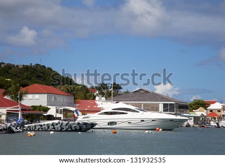 ST BARTHS, FRENCH WEST INDIES - NOVEMBER 8: Luxury boats in Gustavia Harbor on November 8, 2012 at St Barth. The island is popular tourist destination during the winter holiday season