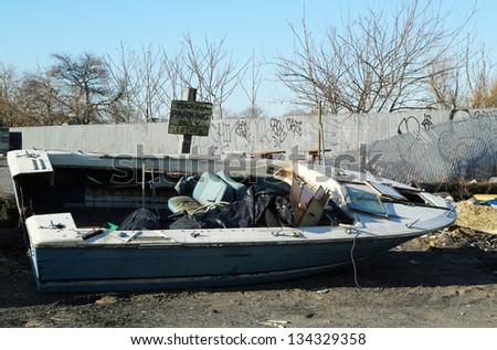 BROOKLYN, NY - APRIL 4: Boat cast ashore in the aftermath of Hurricane Sandy five months after storm on April 4, 2013 in Brooklyn, NY