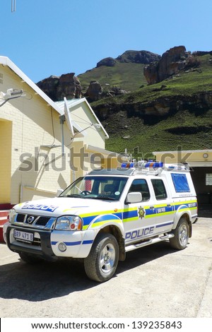 SANI PASS,LESOTHO -SEPTEMBER 19: Police car at Sani Pass border control between South Africa and Lesotho on September 19, 2009. The Kingdom of Lesotho is a landlocked country and enclave.