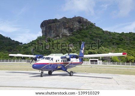 ST. BARTS, FRENCH WEST INDIES -NOVEMBER 9: Winair DHC-6 aircraft ready to take off on November 9, 2012 at St Barts airport. Windward Islands Airways celebrating 50 years of service