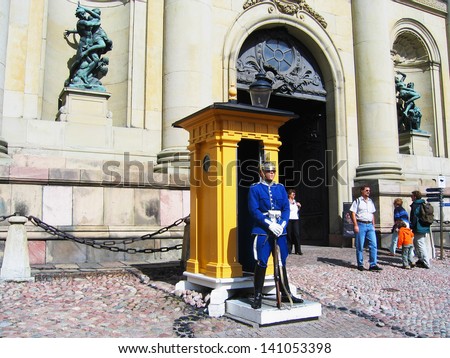 STOCKHOLM, SWEDEN - AUGUST 8: Royal Guard protecting Royal Palace in Stockholm on August 8, 2005. The Life Guards is a combined cavalry infantry regiment of the Swedish Army founded in 1521