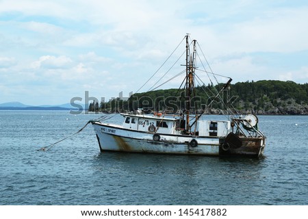 BAR HARBOR, MAINE - JULY 6: Lobster boat at Frenchman Bay near Bar Harbor, Maine on July,6, 2013.  Bar Harbor is a famous summer colony in the Down East region of Maine famous for lobster fishing