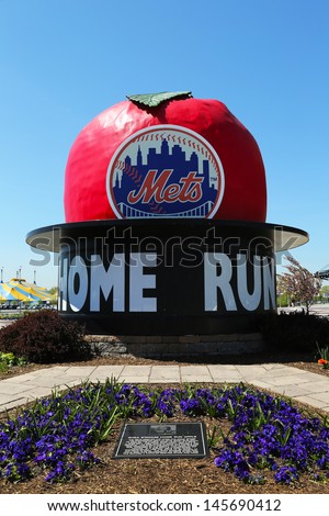 FLUSHING, NY - MAY 2: The Famous Shea Stadium Home Run Apple on Mets Plaza in the front of Citi Field, home of major league baseball team the New York Mets on May 2, 2013 in Flushing, NY.