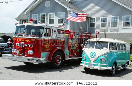 BROOKLYN, NEW YORK - JULY 14:Fire truck and 1966 Volkswagen Bus Vanagon on display at the Mill Basin car show held on July 14, 2013 in Brooklyn, New York