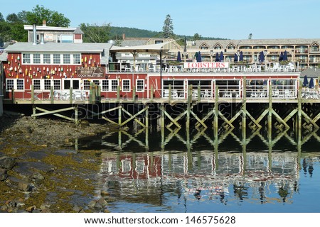 BAR HARBOR, MAINE - JULY 6: Dockside lobster restaurant in historic Bar Harbor on July 6, 2013. Bar Harbor is a famous location in Down East Maine with a long history of lobstering