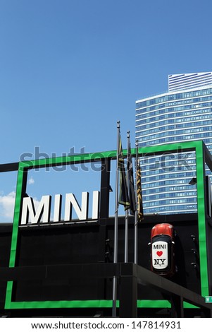 NEW YORK CITY - July 18: Mini Cooper dealership in Manhattan on July 18, 2013.  In 1999 the Mini was voted the second most influential car of the 20th century, behind the Ford Model T