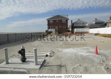 FAR ROCKAWAY, NY - OCTOBER 22: Destroyed beach property in devastated area one year after Hurricane Sandy on October 22, 2013 in Far Rockaway, NY