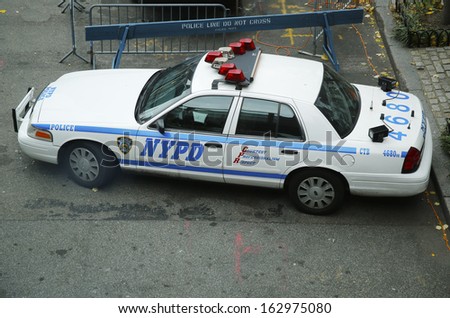 NEW YORK - NOVEMBER 10  NYPD car providing security in World Trade Center area on November 10, 2013. New York Police Department, established in 1845, is the largest police force in USA