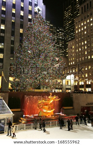 NEW YORK - DECEMBER 19: Lower Plaza of Rockefeller Center with ice-skating rink  and Christmas tree in Midtown Manhattan on December 19, 2013. Ice-skating began since Christmas Day in 1936