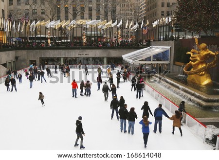 NEW YORK - DECEMBER 19: Lower Plaza of Rockefeller Center with ice-skating rink and Christmas tree in Midtown Manhattan on December 19, 2013. Ice-skating began since Christmas Day in 1936