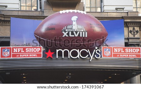 NEW YORK - JANUARY 30: Giant Football at Macy\'s Herald Square on Broadway during Super Bowl XLVIII week in Manhattan on January 30, 2014. Macy\'s Herald Square is an official NFL shop at Super Bowl