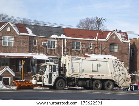BROOKLYN, NEW YORK - FEBRUARY 6:New York Department of Sanitation truck cleaning streets on February 6, 2014 in Brooklyn, NY after massive winter storms strikes Northeast