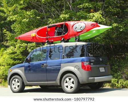 BAR HARBOR, MAINE - JULY 7  Honda Element minivan loaded with kayaks in Acadia National Park on July 7, 2013  Acadia National Park reserves much of Mount Desert Island in Maine
