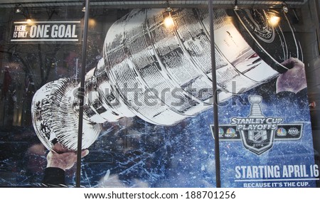NEW YORK CITY - MARCH 20: Stanley Cup Playoffs 2014 logo displayed at the NBC Experience Store window in midtown Manhattan on March 20, 2014