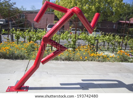 YOUNTVILLE, CA - APRIL 16: Can\'t stop statue by artist Bruce Johnson at public art walk in town of Yountville, California on April 16, 2014