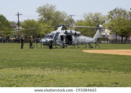 FREEPORT, NEW YORK - MAY 25  MH-60S helicopter from Helicopter Sea Combat Squadron Five with US Navy EOD team taking off after mine countermeasures demonstration during Fleet Week 2014 on May 25, 2014