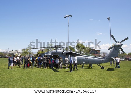FREEPORT, NEW YORK - MAY 25  Numerous spectators around MH-60S helicopter from Helicopter Sea Combat Squadron Five during Fleet Week 2014 on May 25, 2014 in Long Island