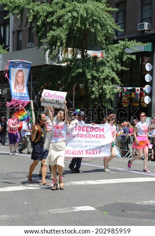 NEW YORK - June 29, 2014: Amnesty International group demanding freedom for Chelsea Manning (born Bradley Manning) during  LGBT Pride Parade  in New York City on June 29, 2014.