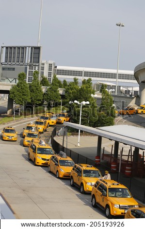 NEW YORK- JULY 10: New York Taxi line next to British Airways Terminal 7 at John F Kennedy International Airport in New York on July 10, 2014.