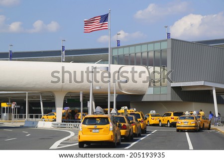 NEW YORK- JULY 10: New York Taxi line next to JetBlue Terminal 5 at John F Kennedy International Airport in New York on July 10, 2014.