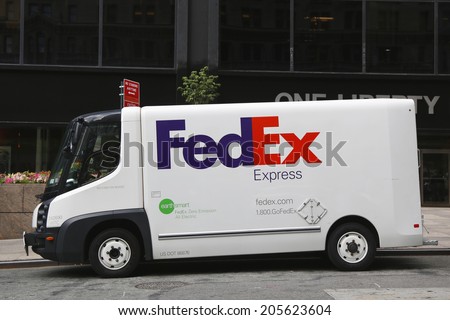 NEW YORK -JULY 17: Earthsmart FedEx zero emission all electrical truck in Lower Manhattan on July 17, 2014. The Nissan e-NV200 added to the delivery fleet as a part of the FedEx EarthSmart program.