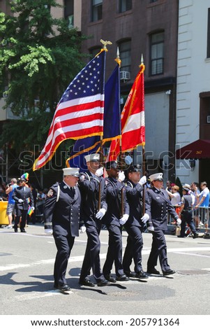 NEW YORK - June 29, 2014: The Color Guard of the New York Police Department during at LGBT Pride Parade in New York on June 29, 2014.