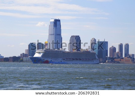 NEW YORK - JULY 6: Norwegian Breakaway Cruise Ship leaving New York on July 6, 2014. Newest Norwegian Cruise Line Ship is the world\'s eighth largest cruise ship start voyages on May 12, 2013