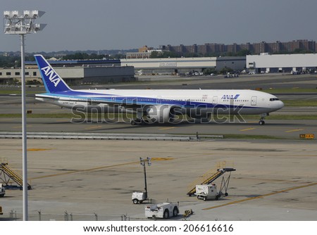 NEW YORK - JULY 22: All Nippon Airways Boeing 777 taxing in JFK Airport in NY on July 22, 2014. JFK Airport is one of the biggest and most busy airports in the world with 4 runways and 8 terminals
