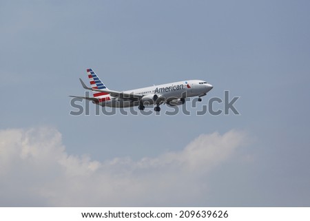 NEW YORK - JULY 8  American Airlines Boeing 737 in New York sky before landing at JFK Airport on July 8, 2014  In 2013 the American Airlines fleet consists of 621 aircraft