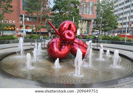 NEW YORK - AUGUST 7: Red Balloon Flower by Jeff Koons at 7 World Trade Center on August 7, 2014. It is one of Koons\' signature highly polished, public stainless steel sculptures