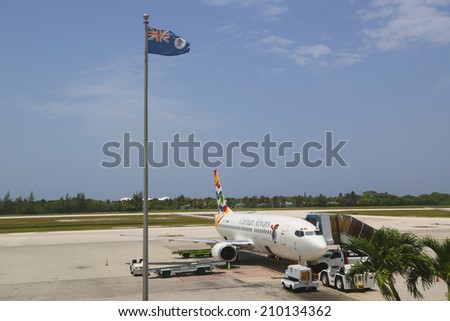 GRAND CAYMAN, CAYMAN ISLANDS - June 13  Cayman Airways Boeing 737 at Owen Roberts International Airport at Grand Cayman on June 13, 2014  It is the flag carrier airline of the Cayman Islands