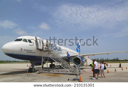 GRAND CAYMAN, CAYMAN ISLANDS - June 13  JetBlue Airbus A320 at Owen Roberts International Airport at Grand Cayman on June 13, 2014