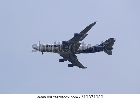 NEW YORK - AUGUST 10: Atlas Air Boeing 747 operated for Qantas Freight in New York sky before landing at JFK Airport on August 10, 2014. Atlas Air is an American cargo and passenger charter airline