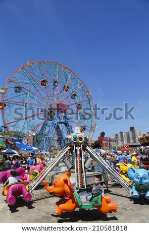 BROOKLYN, NEW YORK - JUNE 15:Wonder Wheel at the Coney Island amusement park on June 15, 2014. Deno\'s Wonder Wheel a hundred and fifty foot eccentric Ferris wheel. This wheel was built in 1920