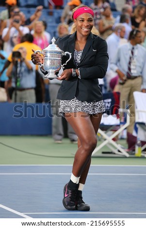 NEW YORK  - SEPTEMBER 7 Eighteen times Grand Slam champion and US Open 2014 champion Serena Williams holding US Open trophy during trophy presentation on September 7, 2014 in New York
