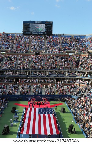 NEW YORK- SEPTEMBER 7  US Marine Corps unfurling American Flag  during the opening ceremony of the US Open 2014 women final at Billie Jean King National Tennis Center on September 7, 2014 in New York