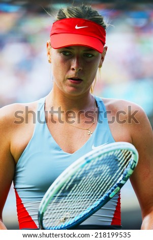 NEW YORK- AUGUST 31: Five times Grand Slam champion Mariya Sharapova during third round match at US Open 2014 against Caroline Wozniacki at Arthur Ashe stadium on August 31, 2014 in New York