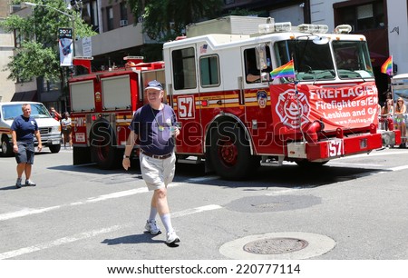 NEW YORK - JUNE 29: FDNY truck at LGBT Pride Parade in New York City on June 29, 2014. LGBT pride march takes place during pride week and is the culmination of week long festivities