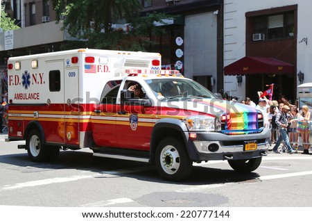 NEW YORK - JUNE 29: EMS truck at LGBT Pride Parade in New York City on June 29, 2014. LGBT pride march takes place during pride week and is the culmination of week long festivities