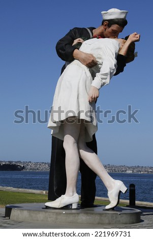 SAN DIEGO, CALIFORNIA - SEPTEMBER 29: The Unconditional Surrender sculpture by Seward Johnson in the front of USS Midway in San Diego on September 29, 2014.
