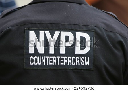 NEW YORK - SEPTEMBER 2: NYPD counter terrorism officer providing security at National Tennis Center during US Open 2014 on September 2, 2014 in New York