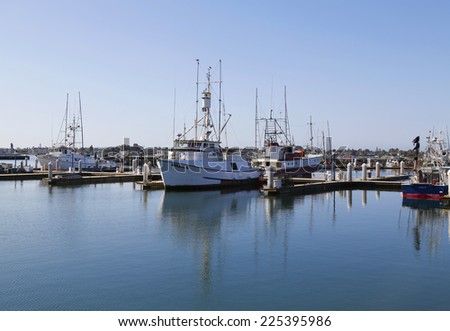 SAN DIEGO - SEPTEMBER 29 - Famous San Diego Tuna fishing boats in San Diego Harbor on September 29, 2014. From the early thirties San Diego was known as the Tuna Capital of the World
