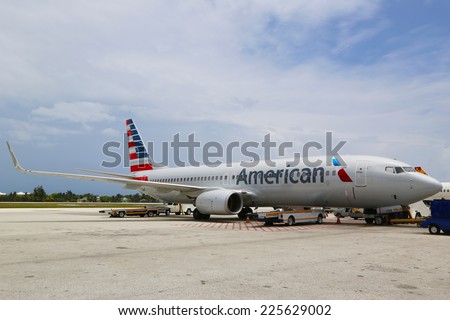 GRAND CAYMAN, CAYMAN ISLANDS -June 10:American Airlines Boeing 737 at Owen Roberts International Airport at Grand Cayman on June 10, 2014. In 2013 the American Airlines fleet consists of 621 aircraft