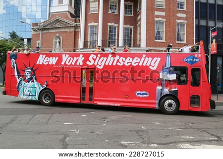 NEW YORK - JUNE 24:New York Sightseeing Hop on Hop off bus in Manhattan on June 24, 2014. Since 1926, Gray Line New York is the source for best double decker bus and deluxe motor coach tours
