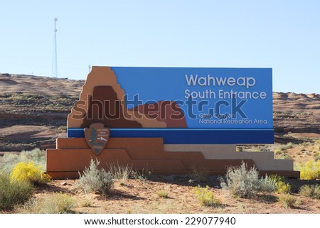 PAGE, ARIZONA - SEPTEMBER 22: Glen Canyon National Recreation Area Wahweap South Entrance sign in Page on September 22, 2014. Wahweap Marina is a largest marina at Lake Powell in Arizona