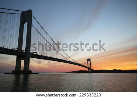 NEW YORK - NOVEMBER 9: Verrazano Bridge in New York on November 9, 2014.The Verrazano Bridge is a double-decked suspension bridge that connects the boroughs of Staten Island and Brooklyn