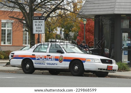 OCEANSIDE, NEW YORK - NOVEMBER 11: Nassau County Police Department car in Oceanside on November 11, 2014. The Nassau County Police Department is the law enforcement agency of Nassau County, New York