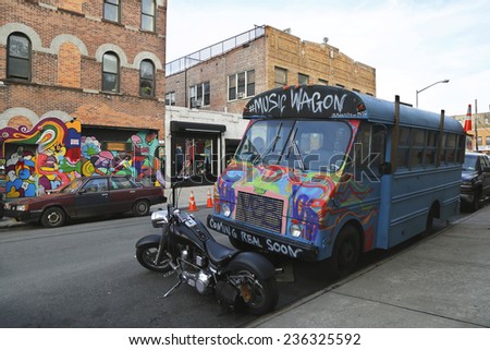 NEW YORK - NOVEMBER 4: Music Wagon covered with graffiti in Brooklyn on November 4, 2014. Outdoor art gallery known as the Bushwick Collective has most diverse collection of street art in Brooklyn